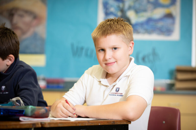 Young Boy Drawing Classroom