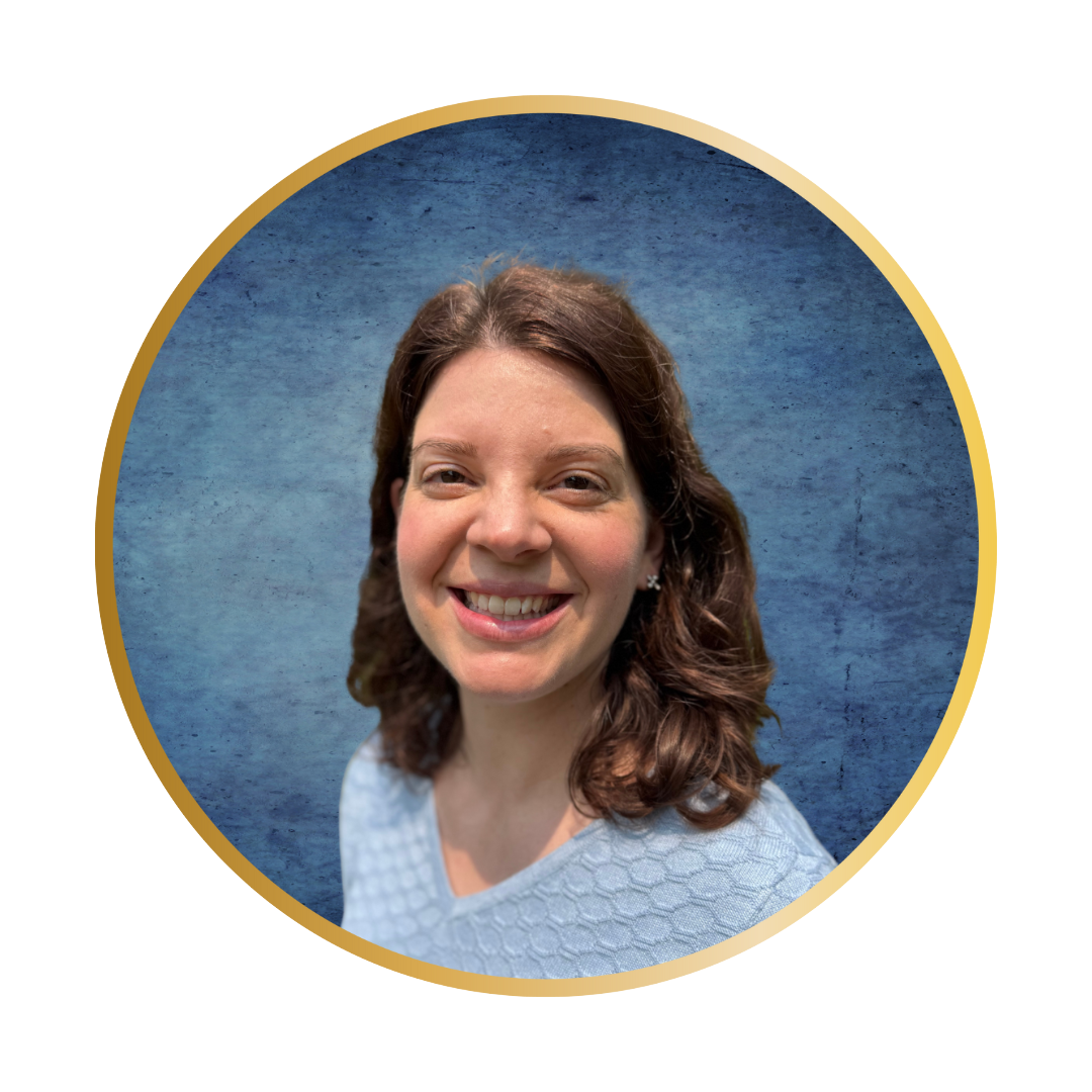 Warm portrait of a smiling woman in light blue, ideal for professional profiles.