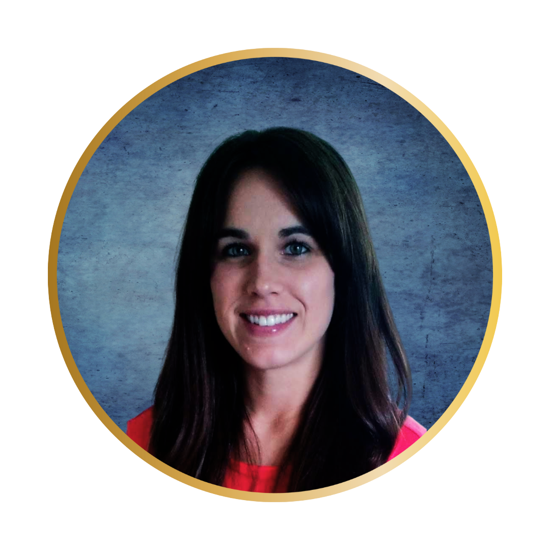 Warm and inviting portrait of a smiling woman in a coral top with dark hair.